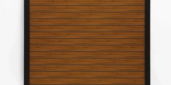 Closed brown wooden shutter with black frame on white wall.