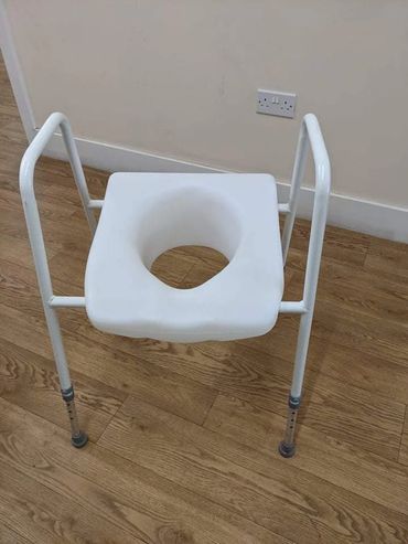 Toilet frame with seat £15 donation.