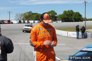 Brayton Laster at the Rattler 250 in Alabama sponsored by Auto Repair VIN stickers