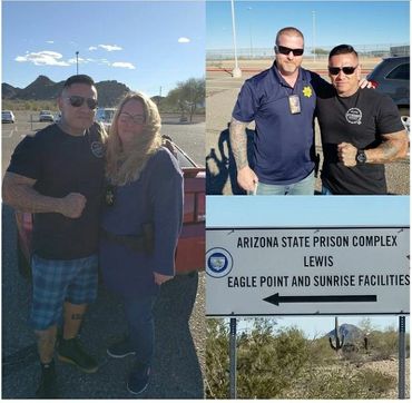 Two men posing with law enforcement officers outside Arizona State Prison Complex.