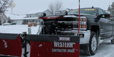 Snow removal services. Snow plowing, Muscatine,  parking lot plowing, ice management.