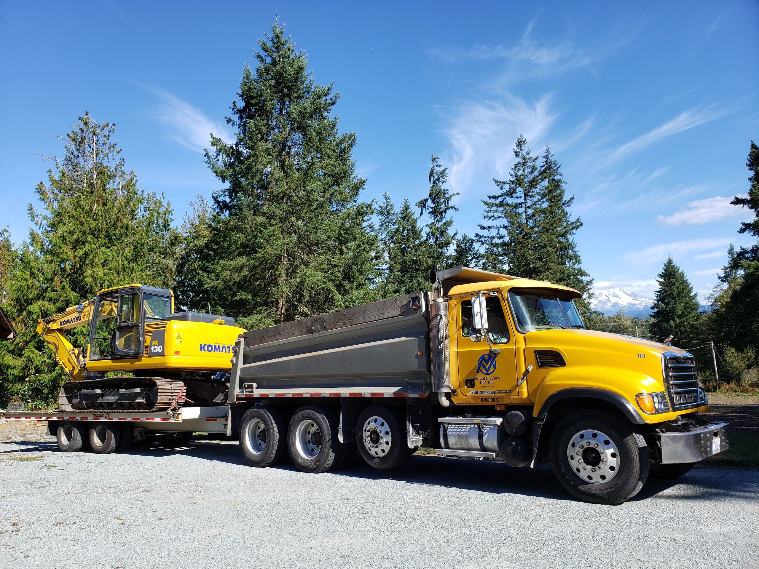 Dump Truck with excavator for dirt work, clearing, foundations, driveways, gravel, rock