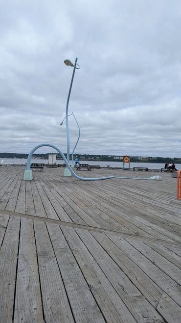 Artists Chris Hanson and Hendrika Sonnenberg have installed three disorderly, personified streetlamp