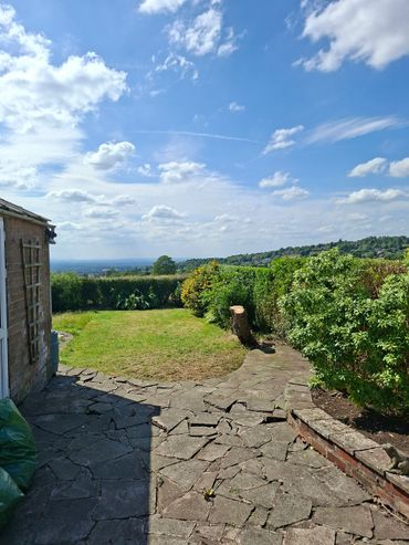 Tree removed and hedge reduced to expose the amazing view