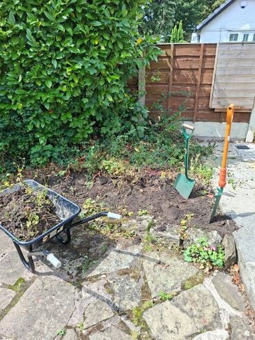 Weeded area in need of some Stone