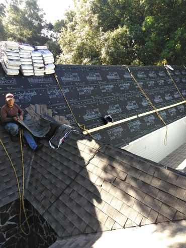 Roofing underlayment replacement on a new roof.