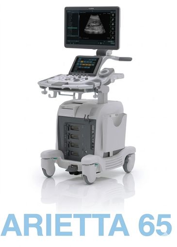 Medical ultrasound machine with display showing an ultrasound image.
