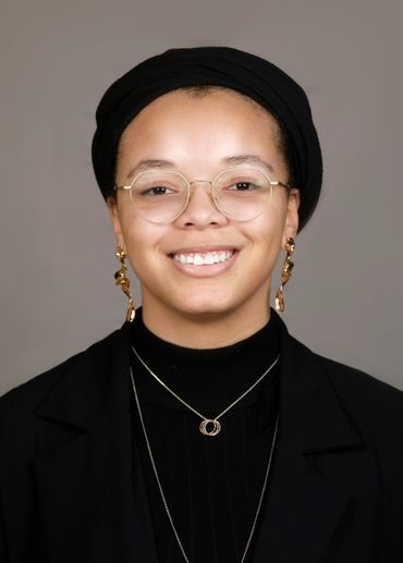 young lady woman glasses jewelry studio portrait headshot