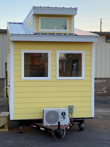 Front view - Mini split unit fan behind the hitch.