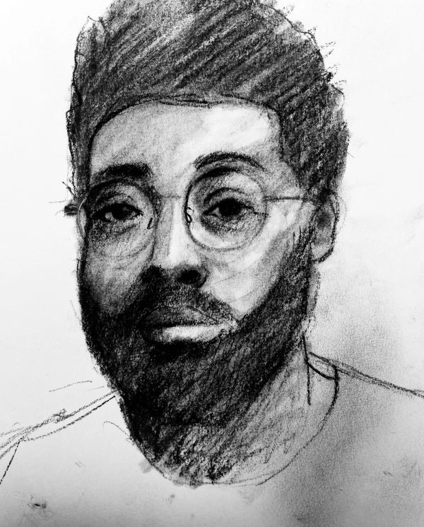 Charcoal sketch of a bearded man with glasses.