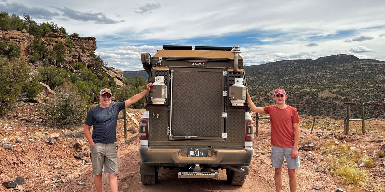 Trevor Martensen and Ethan Martensen on the Rimrocker trail near Moab, UT with their Alu-Cab Canopy 