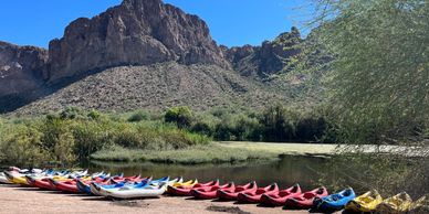 kayak boats lined up on Water Users Beach at Tonto National Forest, Lower Salt River.