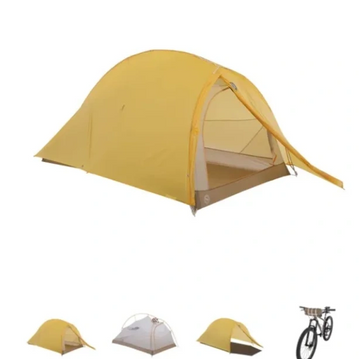 1 person bike packing tent with yellow rain fly.