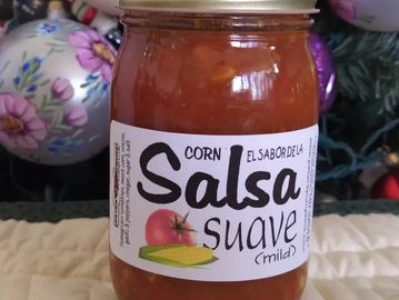 A single jar of hot peach salsa with a peach illustration.