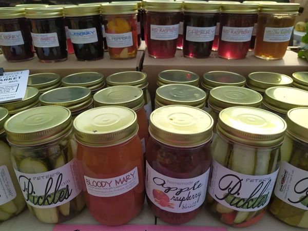Bottles of all the pickles, jams and salsas