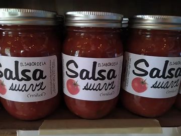 Three jars of mild salsa with a label that says "Suave."