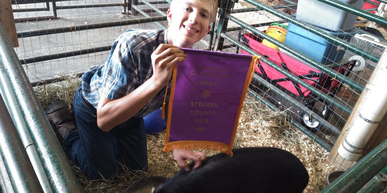 Nate & Ace, 4H teen with his County Fair Champion pig, Bath, NY.