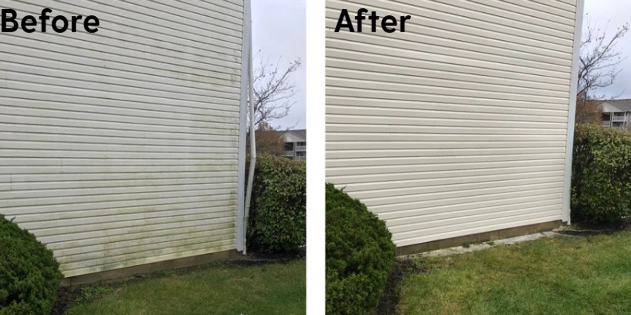 Side of house before and after cleaning grime.