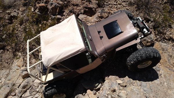 Ray Torres climbing a waterfall