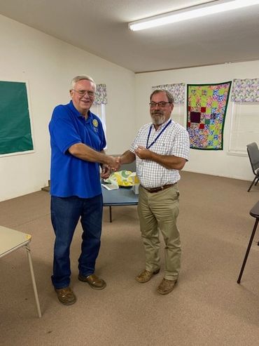 Bill Thedord presenting Doug Haynes with Club Secretary Pin