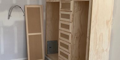 Custom built unfinished closet in tiny home