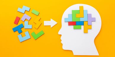 A diagram of puzzle pieces coming together inside someone's mind
