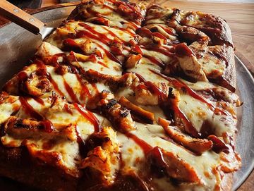 BBQ sauce topped with grilled BBQ chicken & mozzarella