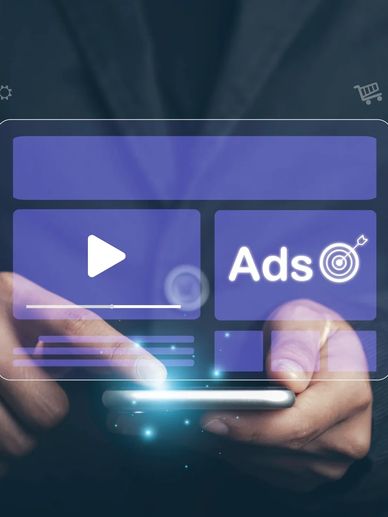 Person tapping smartphone with digital ads and video interface overlay.