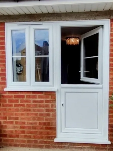 a white uPVC double glazed stable door with the top portion open