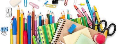 A colorful assortment of school supplies including pencils, notebooks, and scissors.