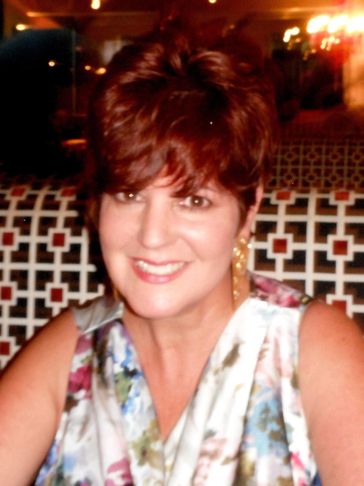 Happy female portrait with a warm smile facing forward