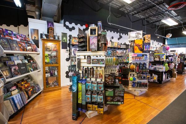 Critical Hit Games retail shelves. Role Play miniatures and books.