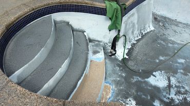 swimming pool sandblasting paint from concrete in NJ