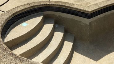 Pool steps after removing paint from surface