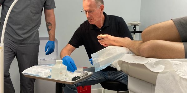 Provider preparing medical supplies