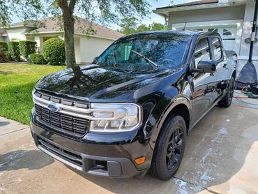 Black Truck that was fully detailed with a wax coating