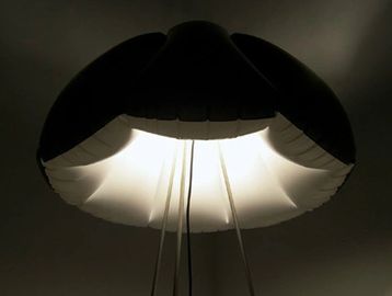Illuminated ceiling light with a unique, rounded design.