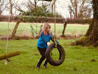 Child playing on outside equipment