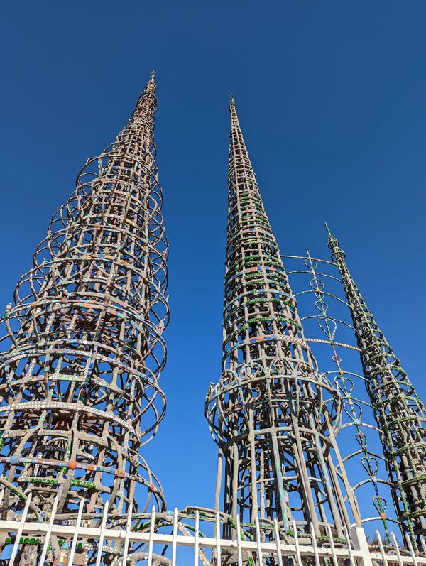 The rebar and mosaic collaged spires of the Watts Towers anchors the cultural hub of Watts neighborh