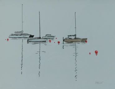 Group of boats at moorings on a calm day