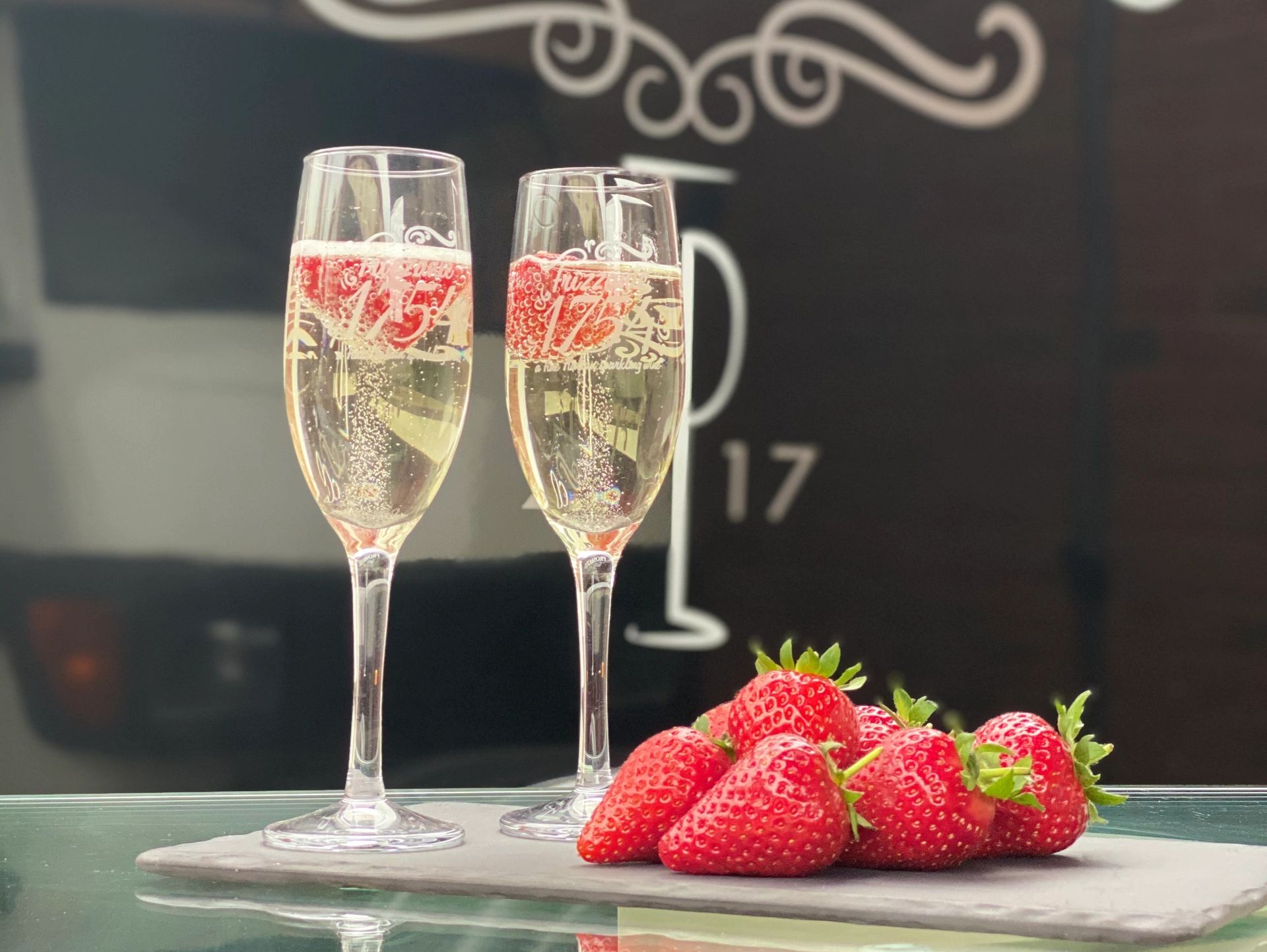 2 glasses of Frizzante next to the Simply prosecco trailer at our Anston business address