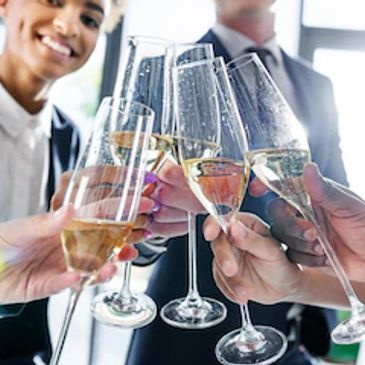 toasting with fizz at a corporate event in greater manchester
