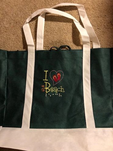 Green with while trim tote bag. I (heart) the Beach in print and beach in Braille. Image of small fl