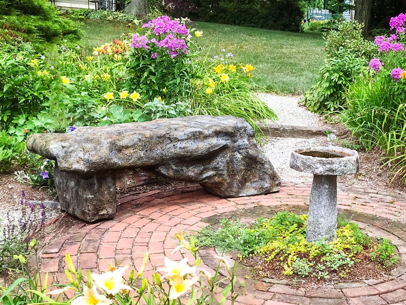 Faux stone bench made with recycled plastic. Lightweight and eco-friendly. Custom stone.
