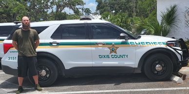 Dixie County Sheriff's Suv with owner of No Collateral Bail Bonds Florida.