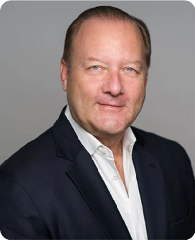 Michael Crow, a finance, private equity, and real estate executive with over 30 years of experience.