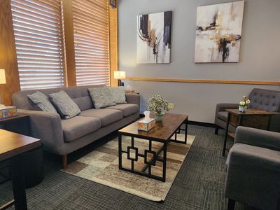 Comfortable and private therapy office to process your thoughts and feelings in Waterville, Maine with comfortable seating at Jon Boschen’s therapy practice