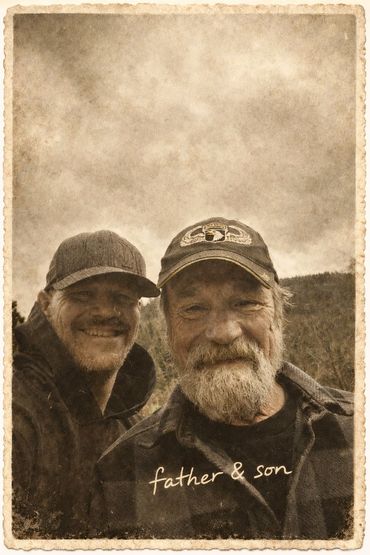 Vintage photo of a smiling father and son outdoors.