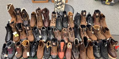 Sales! Our sale table is largely made up of Carhartt and Drew shoes, all at steeply discounted.