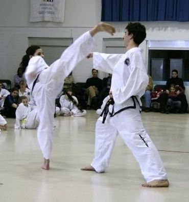 Lightning ITF Taekwondo mentor Mrs. Sonya Howes step sparring.